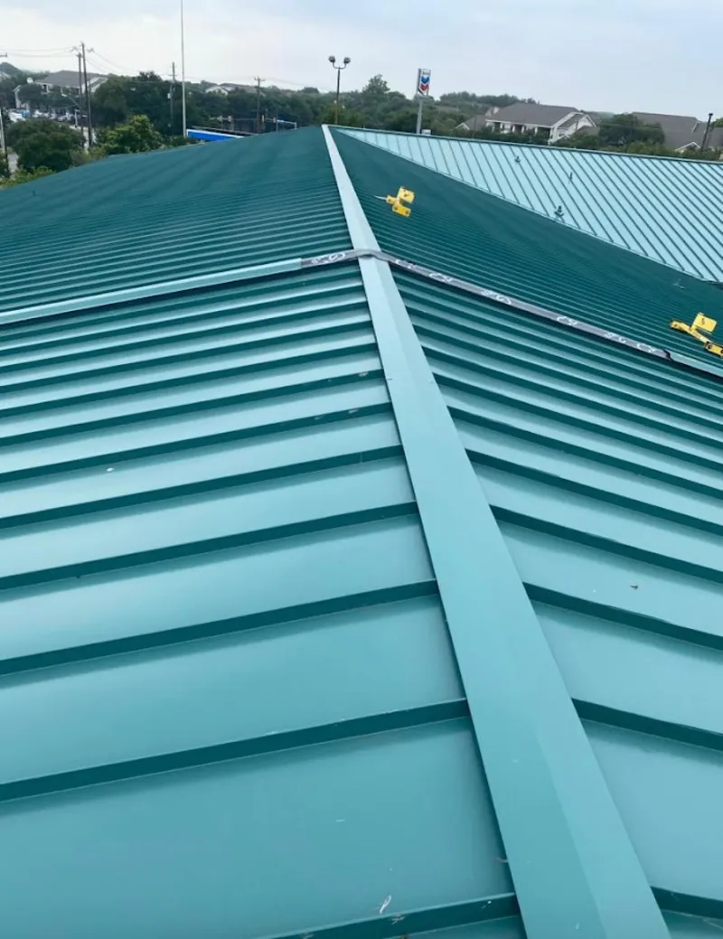 Green commercial metal roof ridge and valley for Metal Roof Repair in Lakeland North