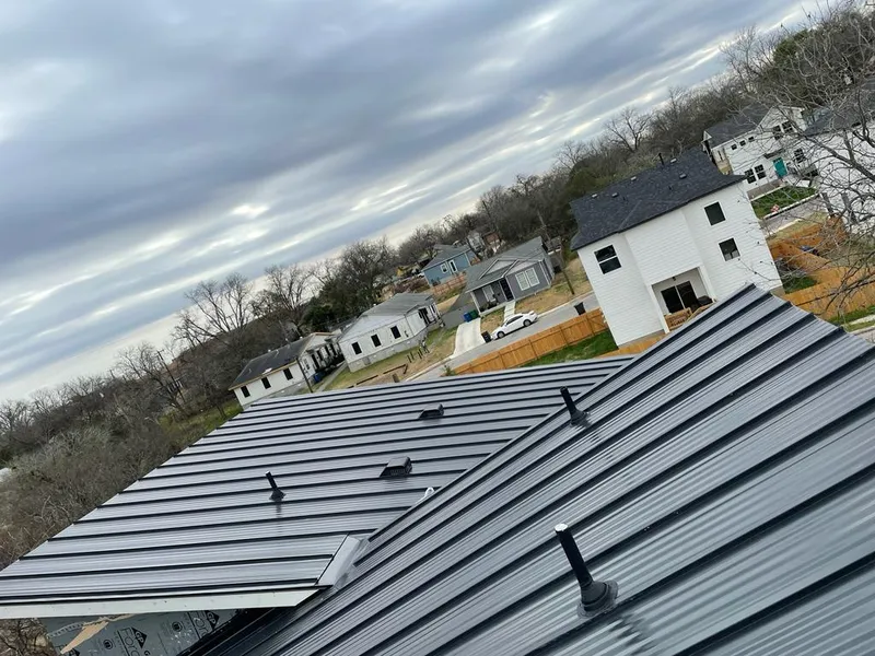 Standing seam metal roof panels with vents for Skylight Repair in Lakeland North